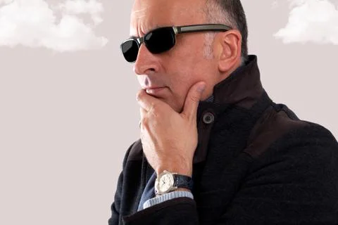 View of a handsome man thinking Stock Photos