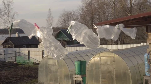 View of hanged transparent plastic bag for reuse. Clothespin bags. Stock Footage 129316333