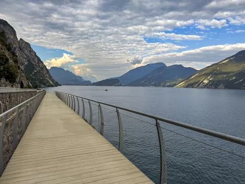 View of the hanging footpath and cycle path over Lake Garda Stock Photos