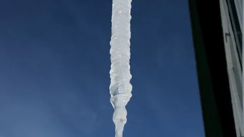 View at hanging frozen icicle of irregular shape. 動画素材 242436982