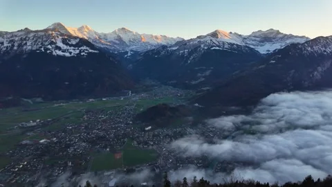 View from Harder Kulm peak overlooking Interlaken, Brienz Lake, and the Swiss Stock Footage 293568725