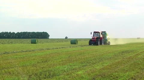 View of harvest fields with combine Stock Footage 60984896