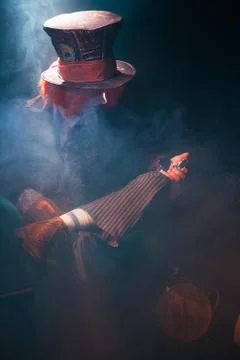 View of the hatter with a mirror through a beam of light Stock Photos