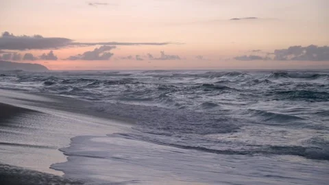 View of Hawaiian beach ocean waves at sunset Honolulu Hawaii Stock Footage 313157476