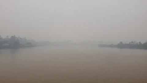 View of the haze caused by forest fires in West Kalimantan Видео 344542561