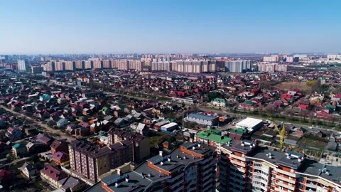 The view from the height of bird flight. Drone flight footage of city blocks Vídeos de archivo 148964053