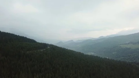 A view from the height of a bird on the mountains Stock Footage 126428501