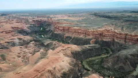 View from a height of the canyon valley with a river in the gorge Video stock 238599324