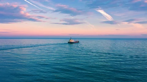 View from the height of Cargo ship sailing in still water.  Stock Footage 120624695