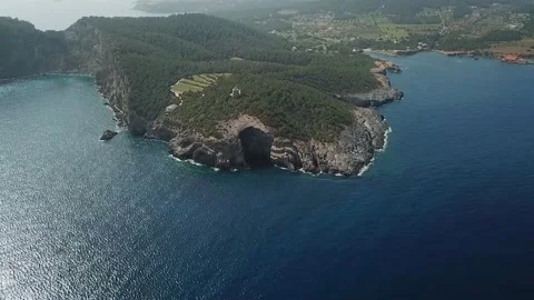 View from height on coast hill with round tower Stock Footage 237052974
