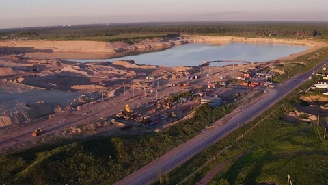 The view from the height of the development of a sand pit. Lake near the sand Stock Footage 105268605