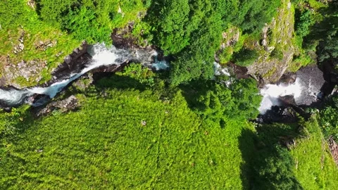 View from the height of a huge waterfall in summer Stock Footage 259615404