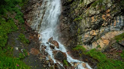 View from the height of a huge waterfall in summer Stock Footage 259643196