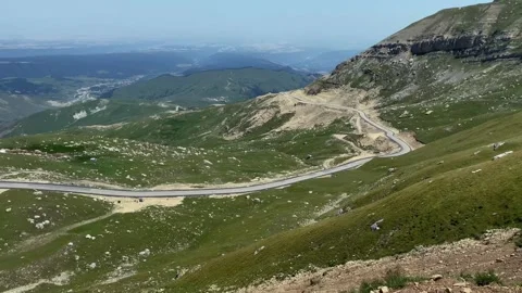View from the height of a long mountain road Stock Footage 316880240