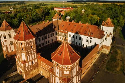 View from the height of the medieval MIR Castle in sunny summer weather Stock Photos