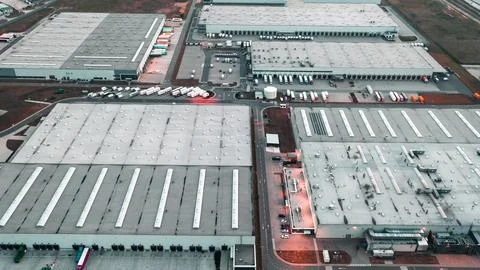 View from a height of modern logistics centers, warehouses for an online stor Stock Photos
