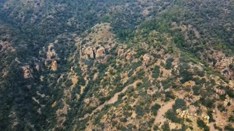 View from a height to the mountain slope with rocks Stock Footage 241245544