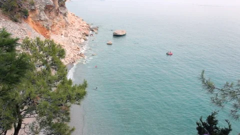 The view from the height of the mountain to the wild beach Stock Footage 111786635