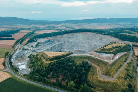 View from a height of an open stone quarry, building stone mining, granite Stock Photos