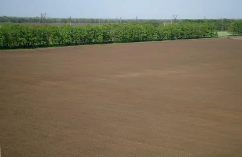 View from a height in a plowed field Stock Photos
