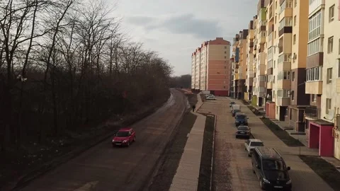 A view from a height from a quadrocopter drone to the new buildings of a new Stock Footage 229324271