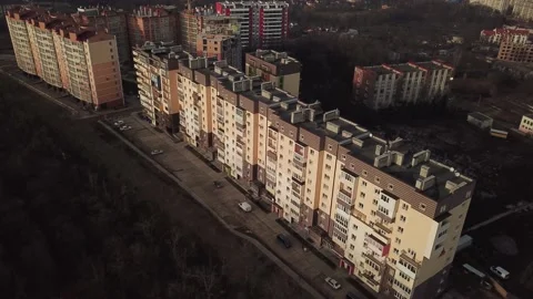 A view from a height from a quadrocopter drone to the new buildings of a new Stock Footage 229324309