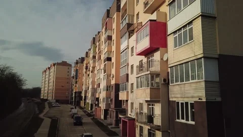 A view from a height from a quadrocopter drone to the new buildings of a new Stock Footage 229324378