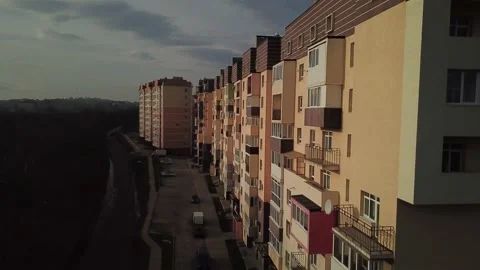 A view from a height from a quadrocopter drone to the new buildings of a new Stock Footage 229324429