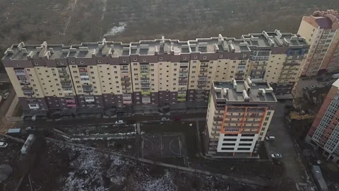 A view from a height from a quadrocopter drone to the new buildings of a new Stock Footage 229324502