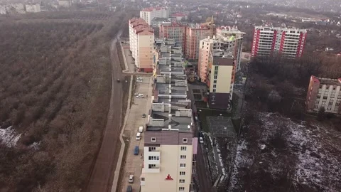 A view from a height from a quadrocopter drone to the new buildings of a new Stock Footage 229324629