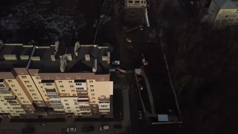 A view from a height from a quadrocopter drone to the new buildings of a new Stock Footage 229324720