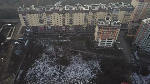 A view from a height from a quadrocopter drone to the new buildings of a new Stock Footage 229324771