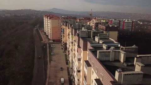 A view from a height from a quadrocopter drone to the new buildings of a new Stock Footage 229324971