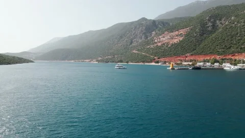 View from the height of the resort town and the harbor among the sea 4k Stock Footage 215000708