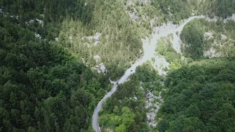 View from a Height to the Road in the Mountain Forest Stock Footage 237986553