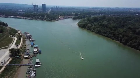 View from a Height of a wide River with Boats Stock Footage 237797933