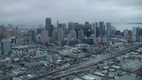 View from helicopter flying over downtown San Francisco buildings and streets Stock Footage 84806149