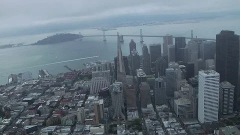 View from helicopter flying over downtown San Francisco buildings and streets  Stock Footage 84807348