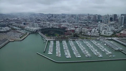 View from helicopter flying over downtown San Francisco Giants Stadium Stock Footage 84807721