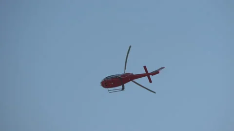 View of a helicopter flying on Sainte-Maxime's sky, France Stock Footage 60362760