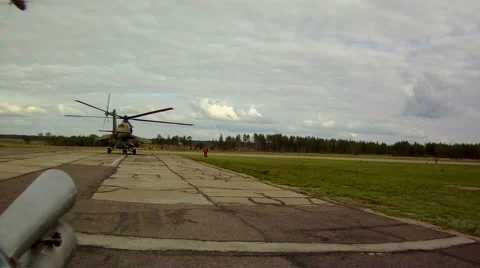 View of helicopter standing on airstrip Stock Footage 68429726
