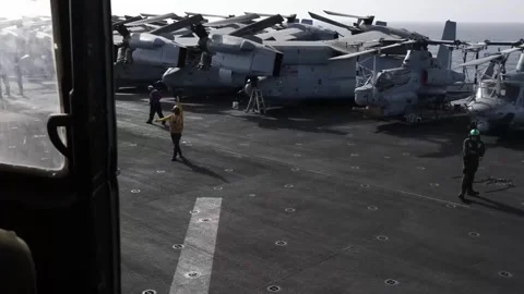 View from helicopter taking off from flight deck of USS Bataan LHD-5 Stock Footage 255780454