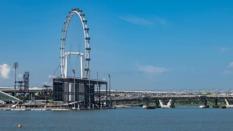 View of helix bridge and flyer in Singapore Timelapse Video stock 93928472