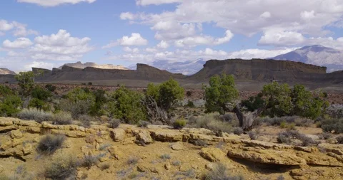 View of Henry Mountains over mesas and canyons near Capitol Reef NP 動画素材 85492741
