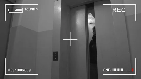 View from hidden camera. Young hipster girl wallking out from elevatro.  Stock-Footage 104732297