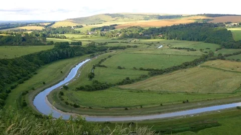 View from High and Over Hill on the meandering Cuckmere River and South Downs 動画素材 82885136