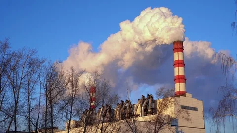 View of high chimney pipe with grey smoke from coal power plant. Production of Stock Footage 126022631
