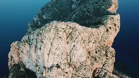 View from the high to the cliff in sea Stock Footage 239541845
