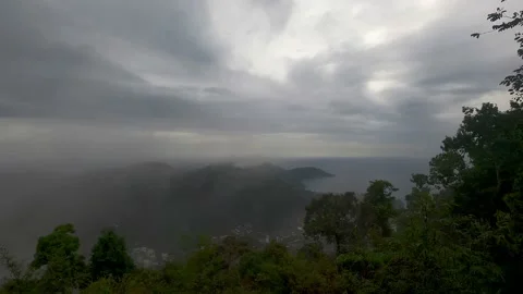 View from a high mountain to the forest in the fog after the rain. Video stock 232220772