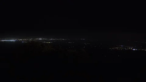 View from high mountain to lights of towns and cities at night in Mallorca Stock-Footage 97082854